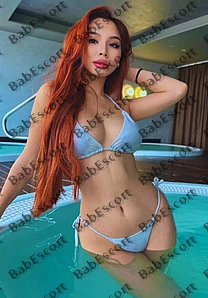 Medina 19 year old Kazakh, Asian, Busty, Red, Long, Breast size C escort in Al Ain